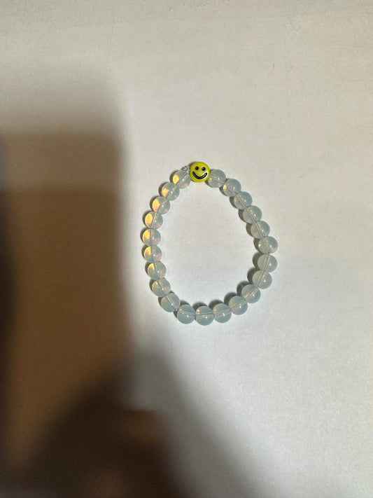 Blue clear smiley face bracelet