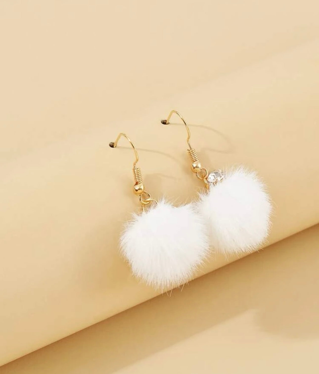 White fluff ball earrings